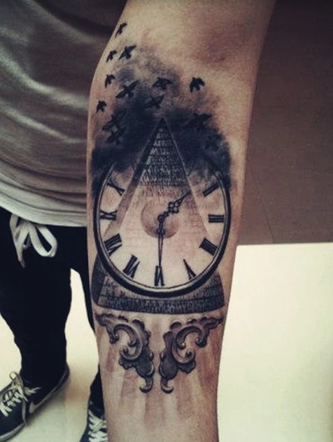 Time Travel men's tattoo with smokey pyramid and clock