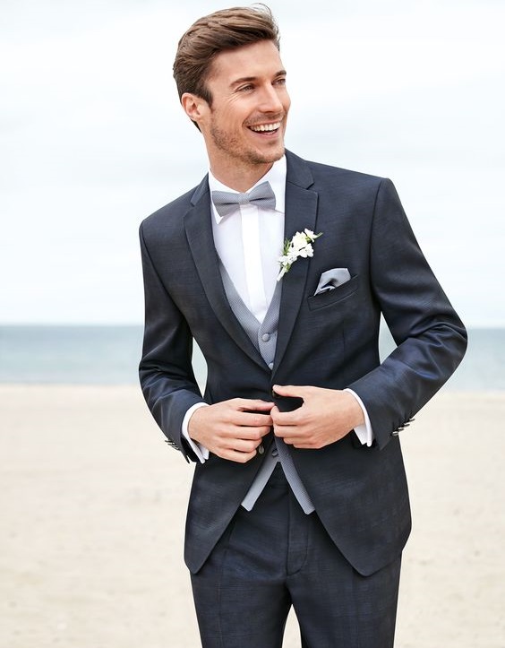 Black and White Formal Suit with matching Gray Vest and Bow as Groomswear